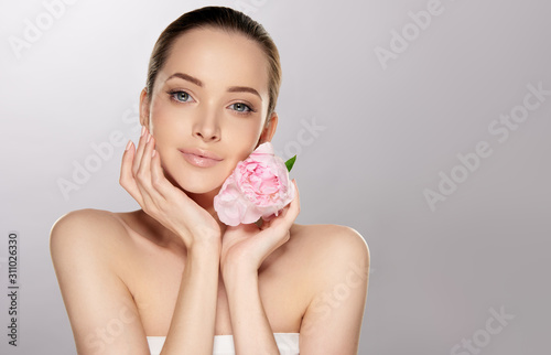 Beautiful young woman with ...