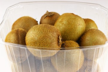 Canvas Print - Basket of kiwi fruit on a white background