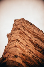 Big Red Rock With White Sky