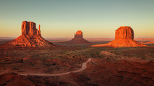 Sunset In The Famous Monument Valley, On The Border Between Arizona And Utah. Navajo Tribal Park