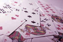 Play cards scattered on the table.