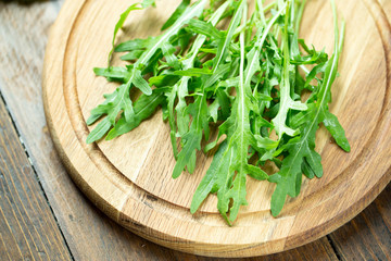 Canvas Print - fresh arugula on the table