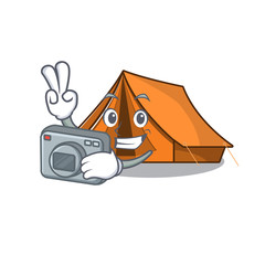 Sticker - a professional Photographer camping tent Scroll mascot style with a camera