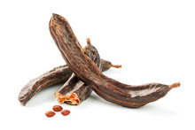 Carob Carob Fruit And Seeds On White Background. Isolate. Organic Carob Beans, A Healthy Alternative To Cocoa.