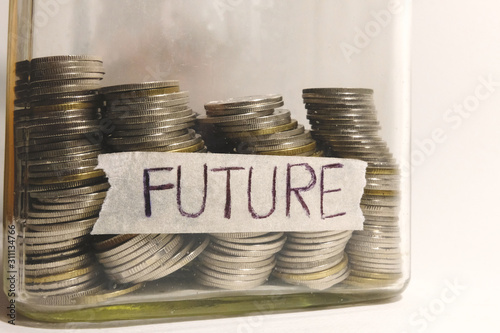 Fotomural Coins money stack in glass jar for money saving financial concept, concept finan