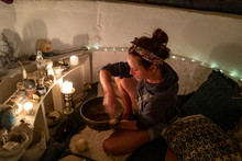 A Woman Uses A Tibetan Singing Bowl To Give A Sound Bath In A Dome