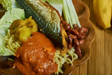 Wall Mural - Ghanaian Kenkey with fried fish and chili pepper