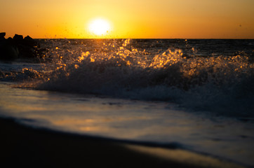 Wave at sunset