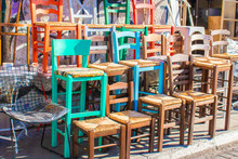 Multi-coloured Chairs Sold On The Street In Athens On A Local Market