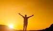© NewmanStudio - happy man silhouette at sunset He feels hope. And encouragement to continue living