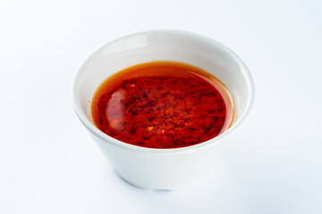 Wall Mural - red hot chilli sauce isolated on a white background