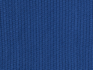 Wall Mural - Handmade knitting texture in classic blue color background. color of the year 2020 pantone