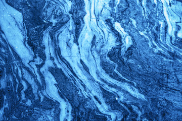curly pattern on marble stone for background trend color classic blue. natural marble texture. marbl
