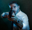 © TheVisualsYouNeed - Man pointing handgun - dramatic action portrait of attractive special agent or police officer aiming with gun in white shirt and tie holding the weapon serious in law enforcement