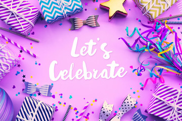 Wall Mural - let's celebrate concepts with text on colorful element prop background