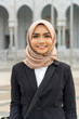 © faizzaki - Cute Malay Woman wearing hijab outdoor executive