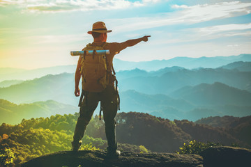 men traveling with a backpack, hiking in the mountains, travel, travel, lifestyle, success, motivati