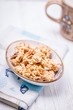 © kvitkanastroyu - Homemade cookies with walnuts and peanuts on a white wooden background. Copy space