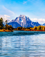 Mount Moran and surrounding Mountains in the Teton Mountain Range of Grand Teton National Park. Viewed from Oxbow Bend of the Snake River in Wyoming, United Sates