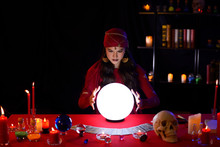 Fortune-teller Woman Is Predicting With A Shining Crystal Ball