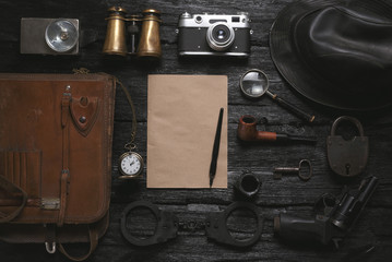 Wall Mural - detective agent table flat lay background. top secret document mock up. investigation tips template.