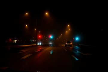 traffic light a dark and foggy night in Karlskoga Sweden