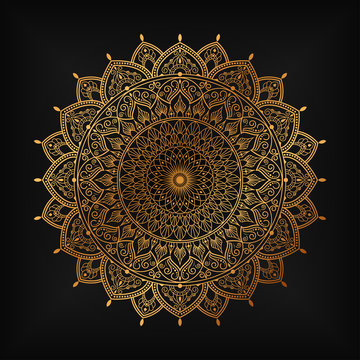 luxury ornamental mandala design background in gold color