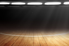 Close Up View Of A Basketball Court With Wooden Floor And Spotlights
