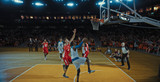 Fototapeta Kuchnia - Basketball players on big professional arena during the game. Tense moment of the game. Celebration