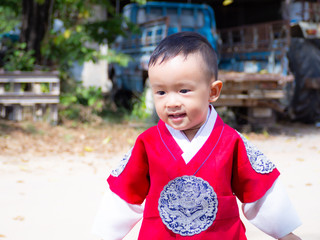 Asian little girl and boy wearing a Korean Traditional Hanbok dress 