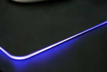 Close Up Of Computer RGB Gaming Mouse Pad, Illuminated By Colored LED