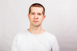© Arsentyev Vladimir - Man with short hair on white background