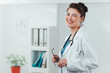 © Suteren Studio - Portrait of Young Woman Doctor with a stethoscope in hospital office