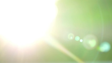 Poster - Abstract footage motion blurred with sunrise light flare background