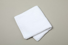 White Towel Isolated On Grey Background, Top View And Space For Text