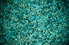 Background Of Sea Pebbles In Turquoise Colors