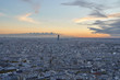Panoramic cityscape with a skyscraper in Paris at sunset, France.