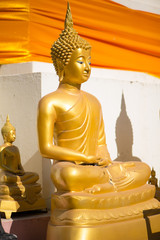 Wall Mural - Gold Buddha in Wat Phra That Bang Phuan in Nongkhai of Thailand