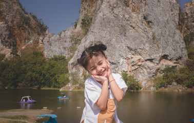  girl standing standing on of the mountain