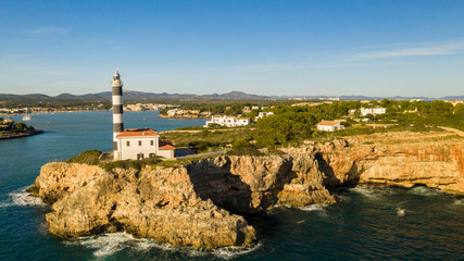 Canvas Print - lighthouse in the Bay of Cala Portocolom Mallorca Spain