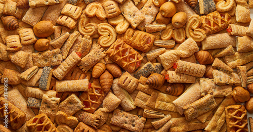 Cuadros en Lienzo Top view of a variety of cookies Texture (background) of the cookie in the studio Cookies wallpaper background Backgrounds and textures: group of various cookies Concept of food and pastry products