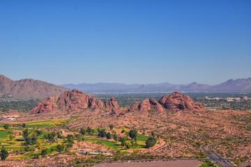 Wall Mural - Arizona Rocky Mountains Aerial view from airplane of abstract Landscapes, peaks, canyons and rural cities flying in to Phoenix, AZ. United States of America. USA.