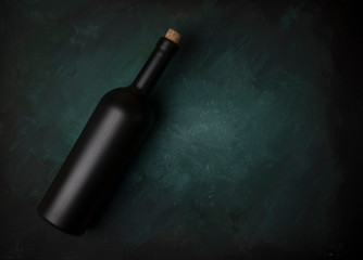 Red wine glasses and bottle on stone background. Top view with copy space