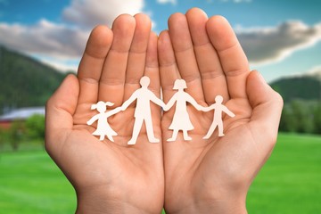 Poster - Paper chain family protected in cupped hands