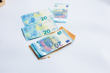 Euro zone money note spread on white background