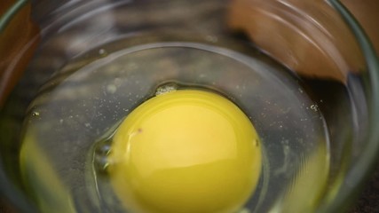 Canvas Print - Rotating Raw Eggs on an old wooden plate (seamless loopable; 4K)