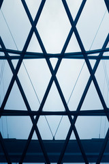 Poster - Glass roof panels. Computer graphics of minimalist business building interior. Abstract modern architecture background with hi-tech geometric structure of rectangular glazing pattern.
