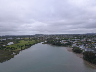 Waiheke Island, Auckland / New Zealand - December 24, 2019: The paradise island Waiheke with its stunning beaches, coastlines, hill terrains and vineyards