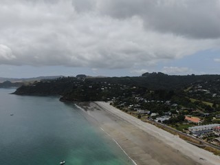 Waiheke Island, Auckland / New Zealand - December 24, 2019: The paradise island Waiheke with its stunning beaches, coastlines, hill terrains and vineyards