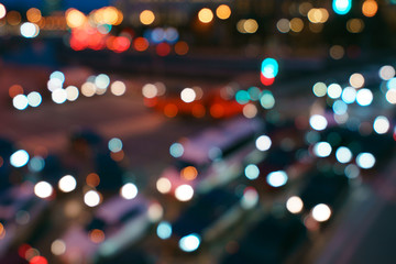 Wall Mural - Defocused photography of crossroad filled  moving cars in night Moscow. Top view / view from above.